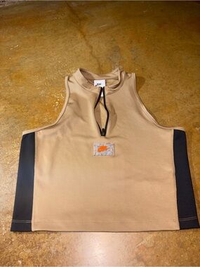 Nike Beige Crop Tank with Black Side Panels and Orange Logo